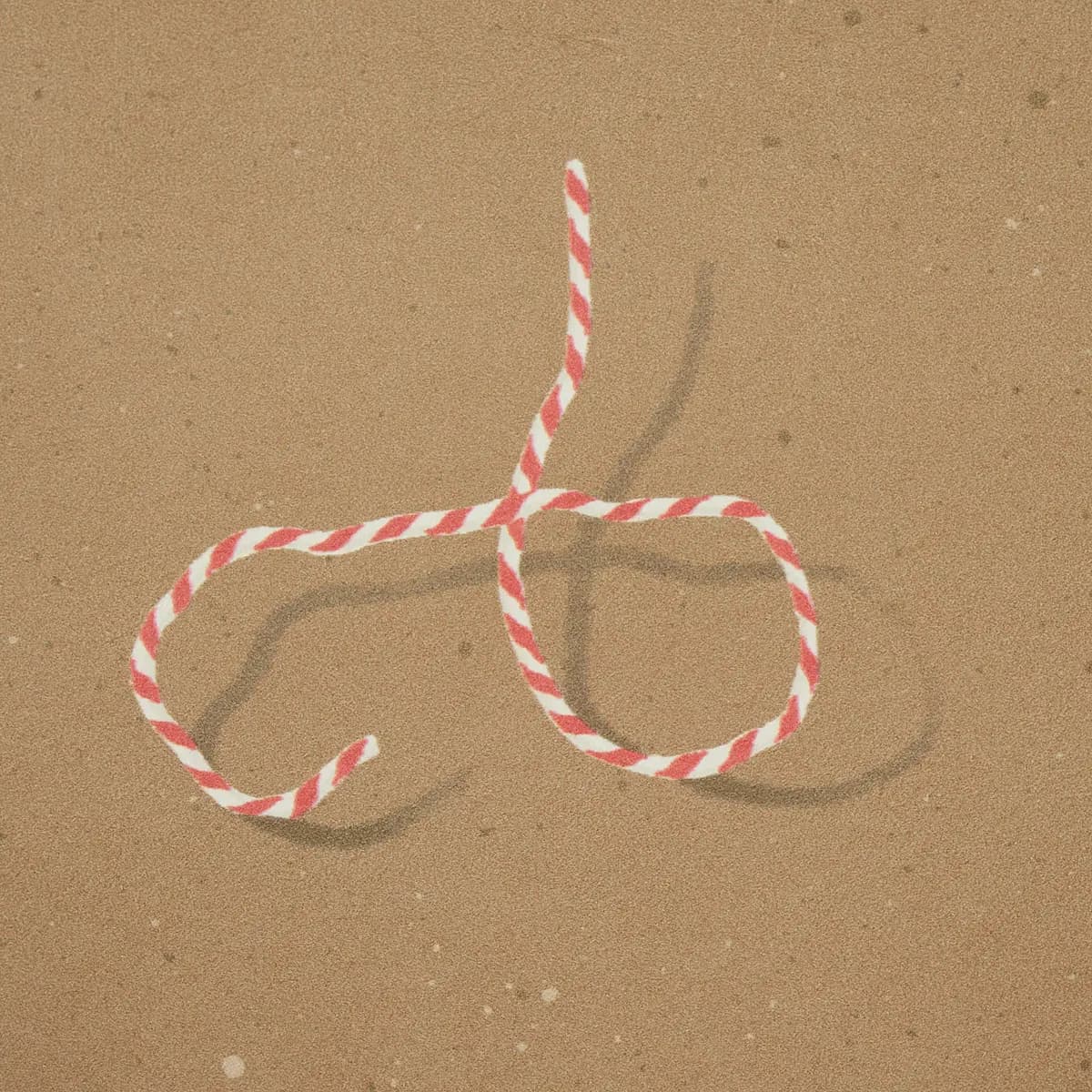 BUTCHER STRING_ RED AND WHITE ON BROWN