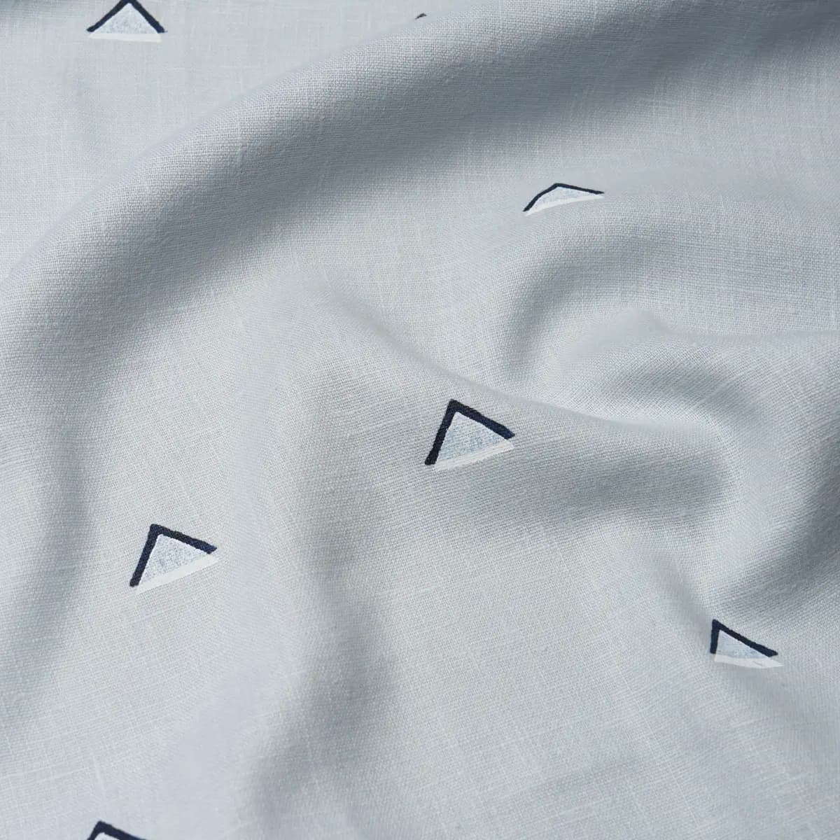 OVERLAPPING TRIANGLES HAND PRINT_ NAVY AND WHITE ON SKY