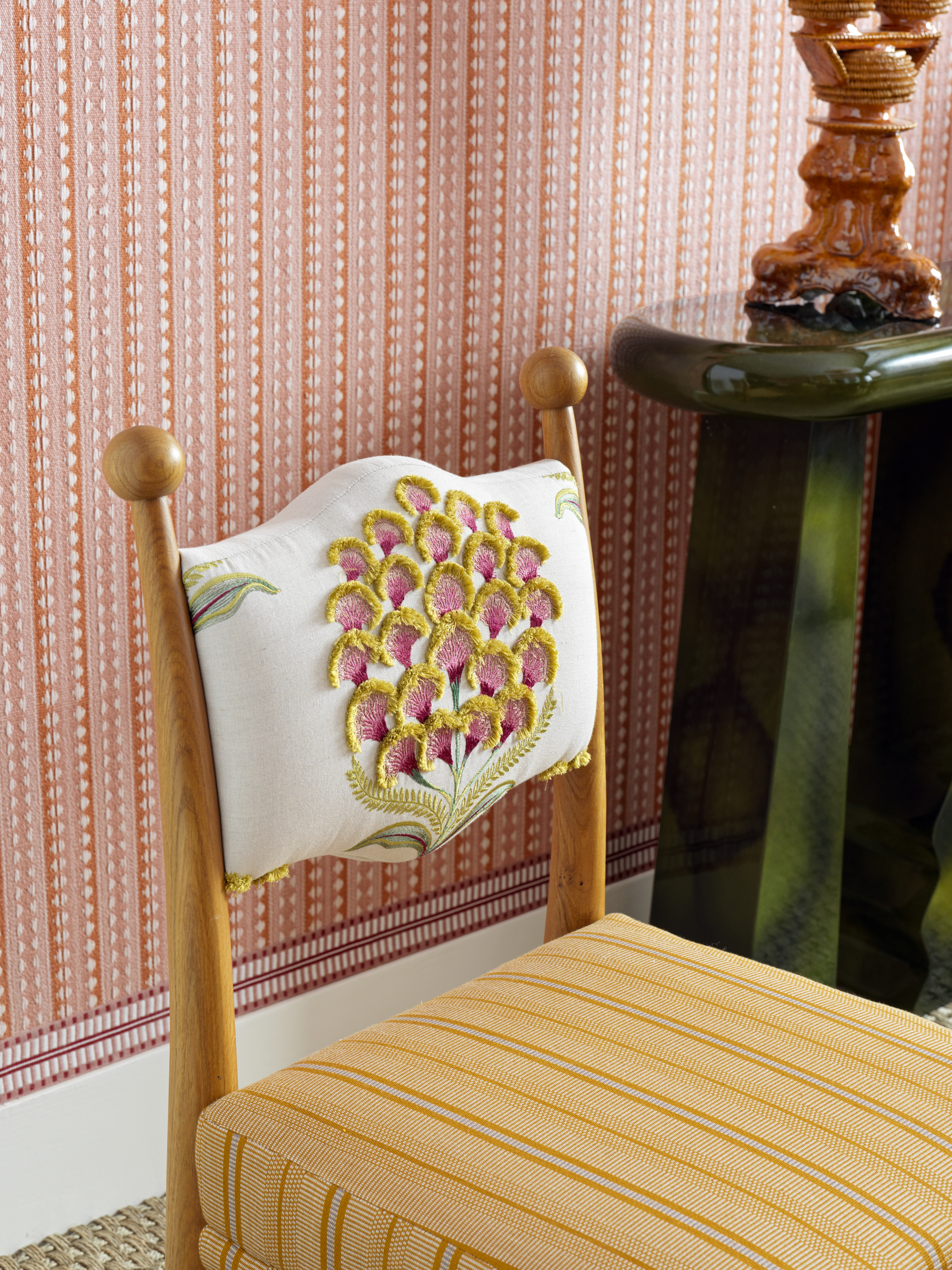 Chair featuring Schumacher's Aurelia Embroidery Fabric. Design by Laura Gonzalez